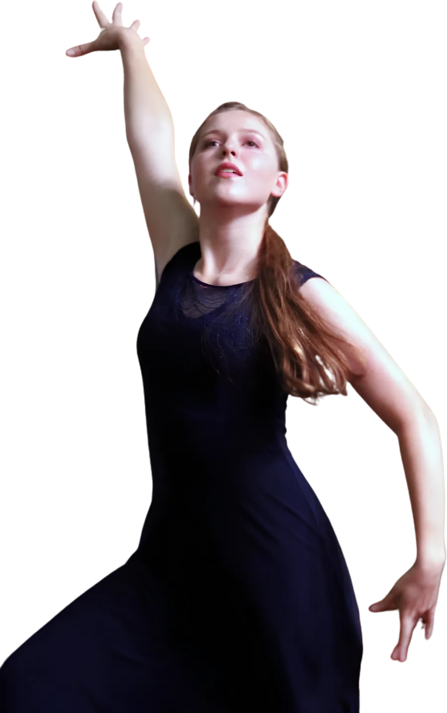 Thalia mid-phrase, one arm reaching above her head